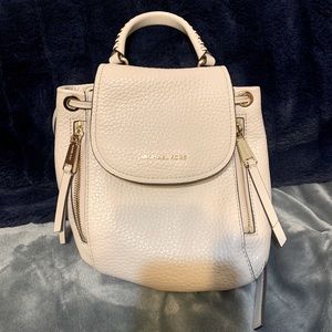 Michael Kors small backpack.